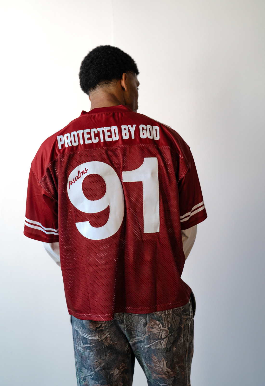 "PROTECTED BY GOD" BOXY JERSEY
